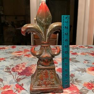 Decorative statue, colors are a blend of browns & greens. Ceramic texture